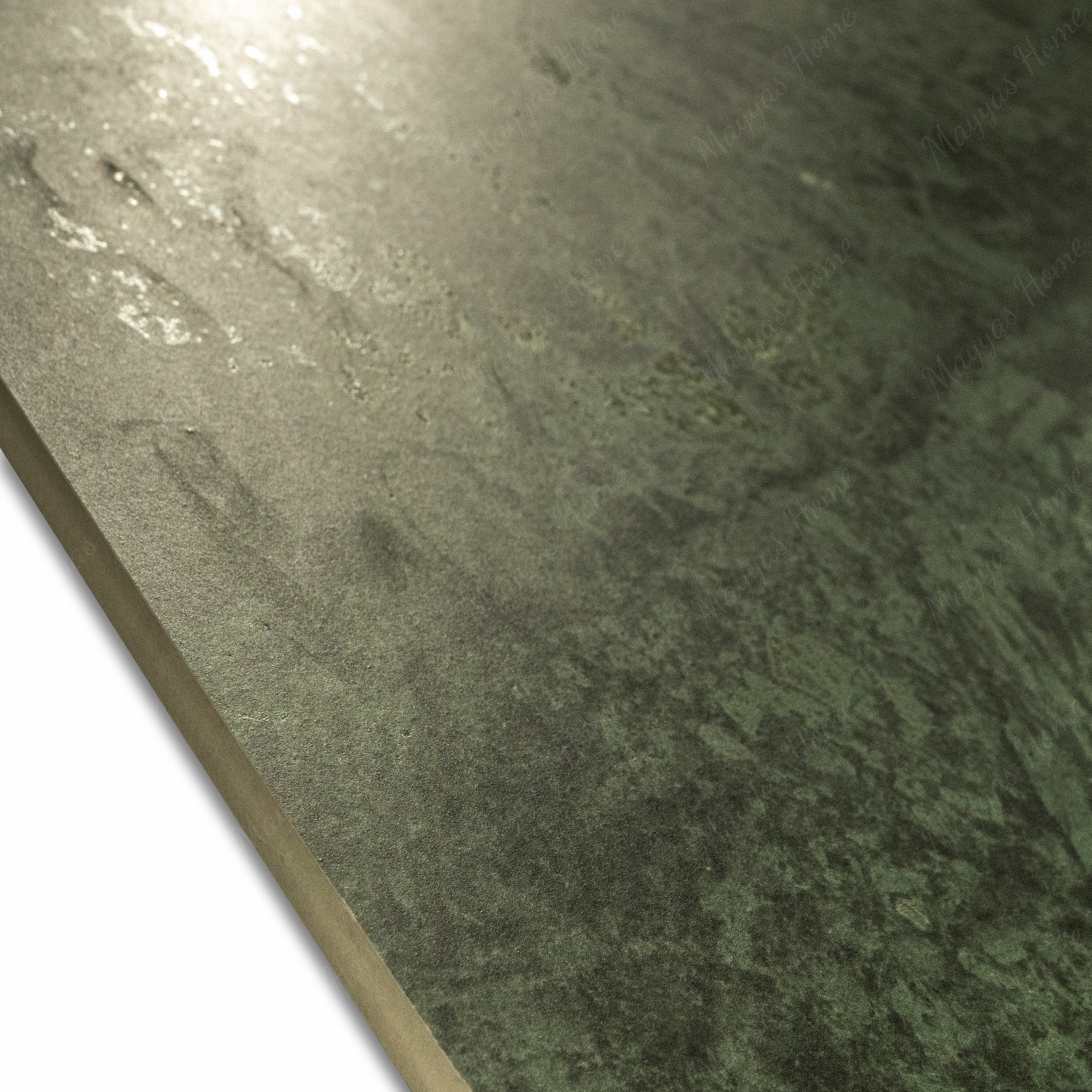 Close-up of Bidasar Excel glossy porcelain slab showing reflective polished green surface, textured detail, and 9mm rectified edge thickness