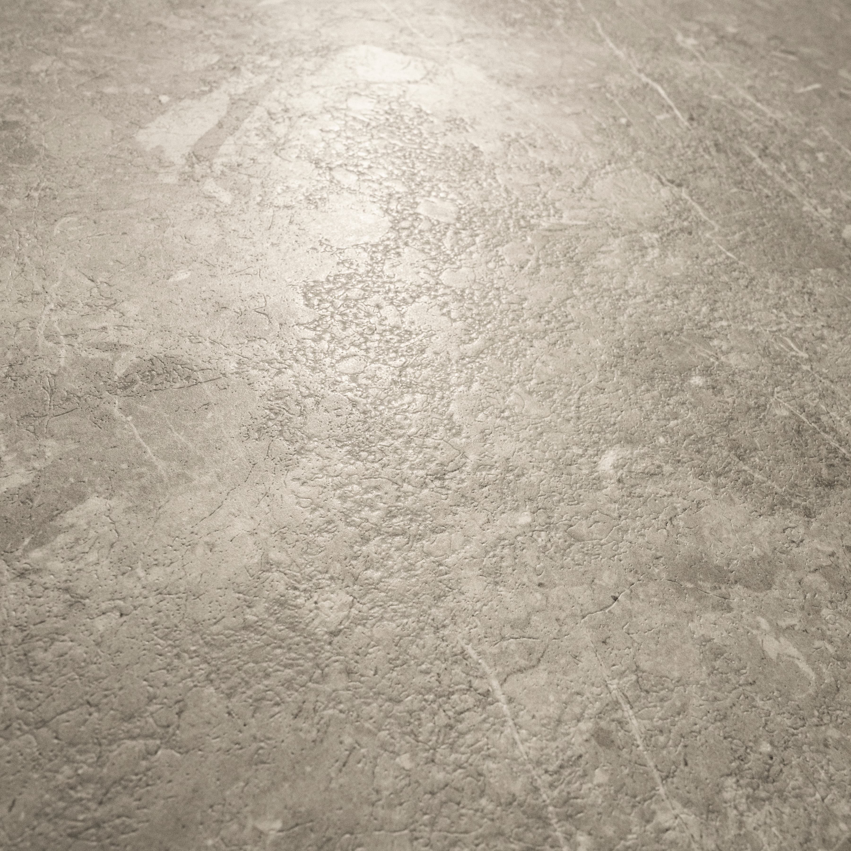 Element Coach Smoke large format porcelain slab angled view highlighting matte stone finish, rustic mineral texture, and rectified edges