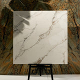 Signora 120x120cm glossy porcelain tile flat view showing ivory marble surface with dramatic gold and grey veining
