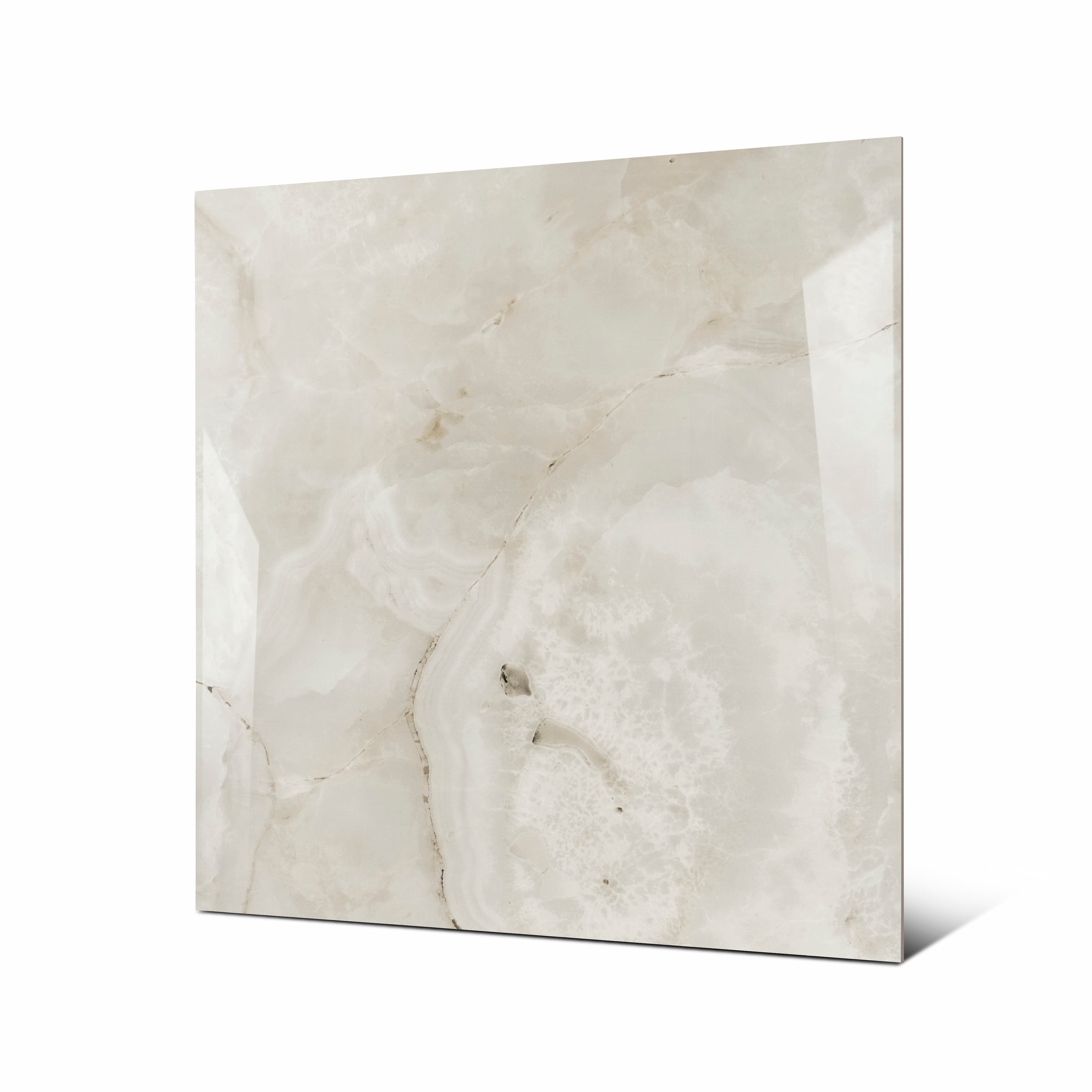 Marbella Gold large format porcelain tile angled view highlighting polished onyx finish, natural crystalline patterns, and rectified edges