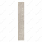 Vero White Ash porcelain plank flat view showing soft whitewashed ash wood grain with natural knots and pale grey tonal detailing