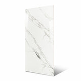 Garfagnana BM porcelain slab flat view showing bright white Calacatta-look surface with intricate branching grey veining and natural marble movement
