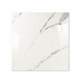 Statuario Hexa glossy porcelain tile 120x120cm displayed on easel against luxury marble backdrop for UAE interior design
