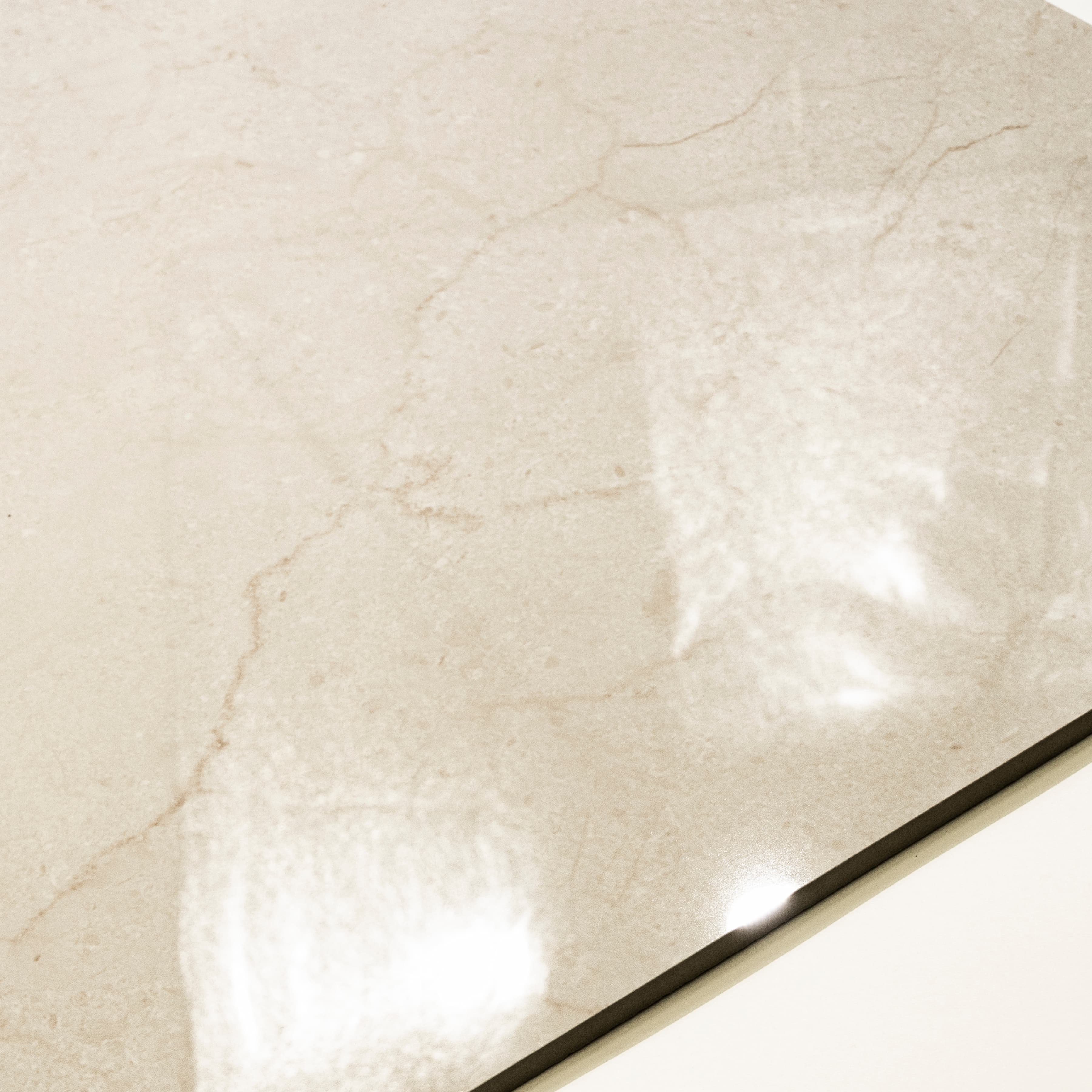 Shop ULT MARFIL PRO large format porcelain tiles (120x120cm) with a 9MM glossy finish and premium ivory marble effect. Durable, scratch-resistant, and easy to install. Perfect for elegant interiors.