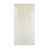 Bulgari Crema porcelain slab displayed on easel against luxury backdrop showing soft cream stone surface with subtle natural veining for UAE interior design