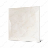 Crema Onyx large format porcelain tile angled view highlighting polished cream marble look and rectified edges
