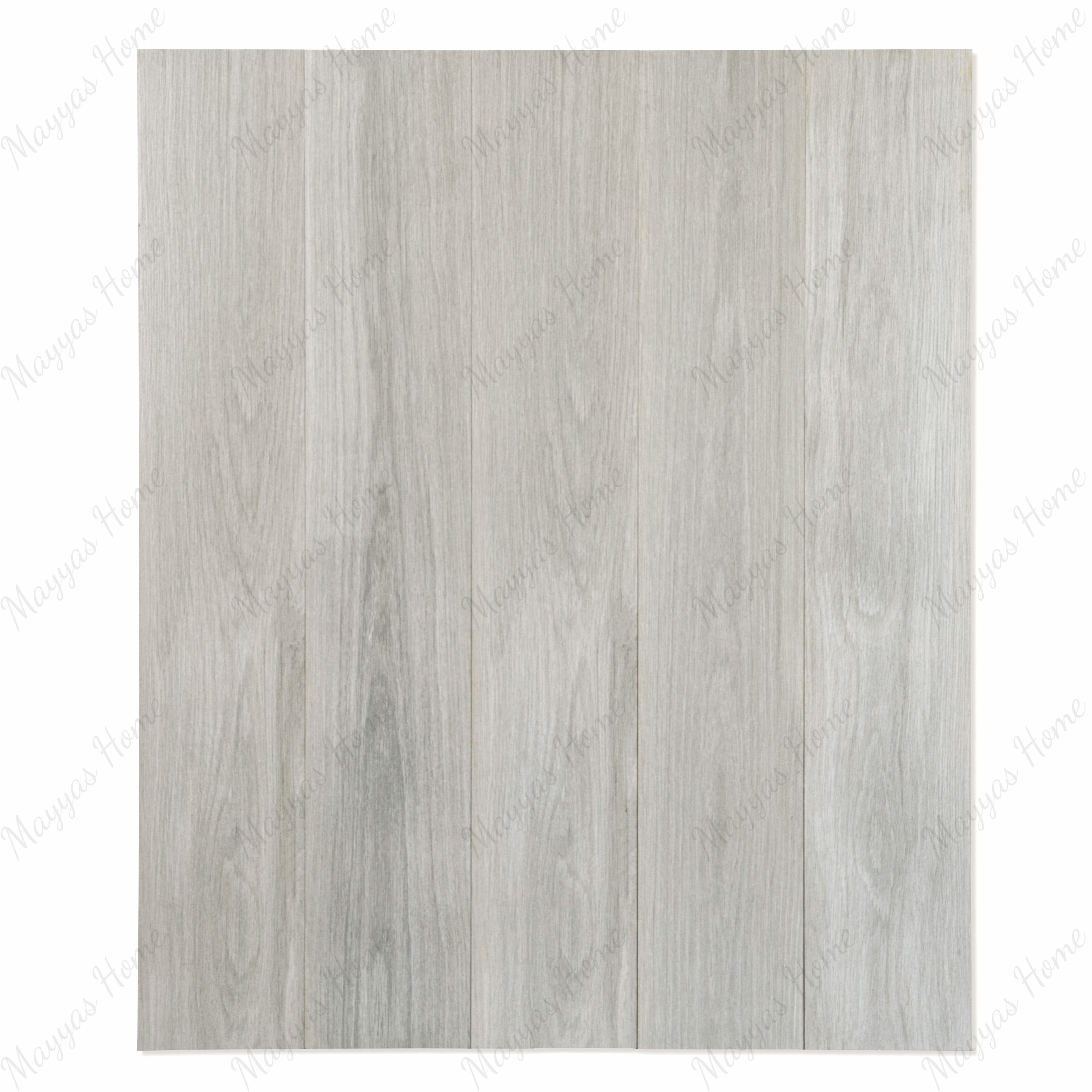 Close-up view of Spanish Grey plank tile showing matte wood-textured finish