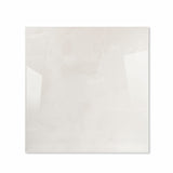 Onyx Helio glossy porcelain tile 120x120cm displayed on easel against luxury marble backdrop for UAE interior design