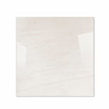 Melton Bianco glossy porcelain tile 120x120cm displayed on easel against luxury marble backdrop for UAE interior design