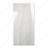 Explore the GLACIER WHITE large format porcelain tile, 60x120cm with a glossy marble-look finish. Durable 9MM porcelain tile ideal for floors and walls, offering elegance, easy installation, and lasting beauty.
