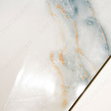 Grazzu Azul glossy marble effect porcelain tile 60x120cm with 9mm thickness features rich blue tones and polished luxury finish.