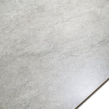 Raxsnow porcelain tile 60×120cm features a soft white stone finish with durable porcelain strength, ideal for elegant floors and walls.