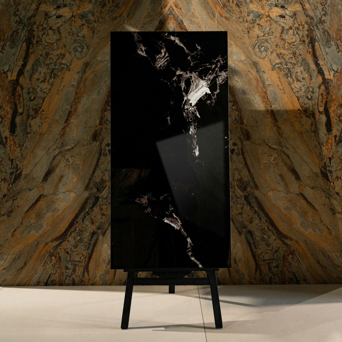 Roxy Black glossy marble effect porcelain tile 60x120cm with 9mm thickness features deep black base, soft grey veining and polished finish.