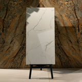 Statuario Ocean glossy marble effect porcelain tile 60x120cm with 9mm thickness features white base, soft grey veining, subtle ocean tones and polished finish.