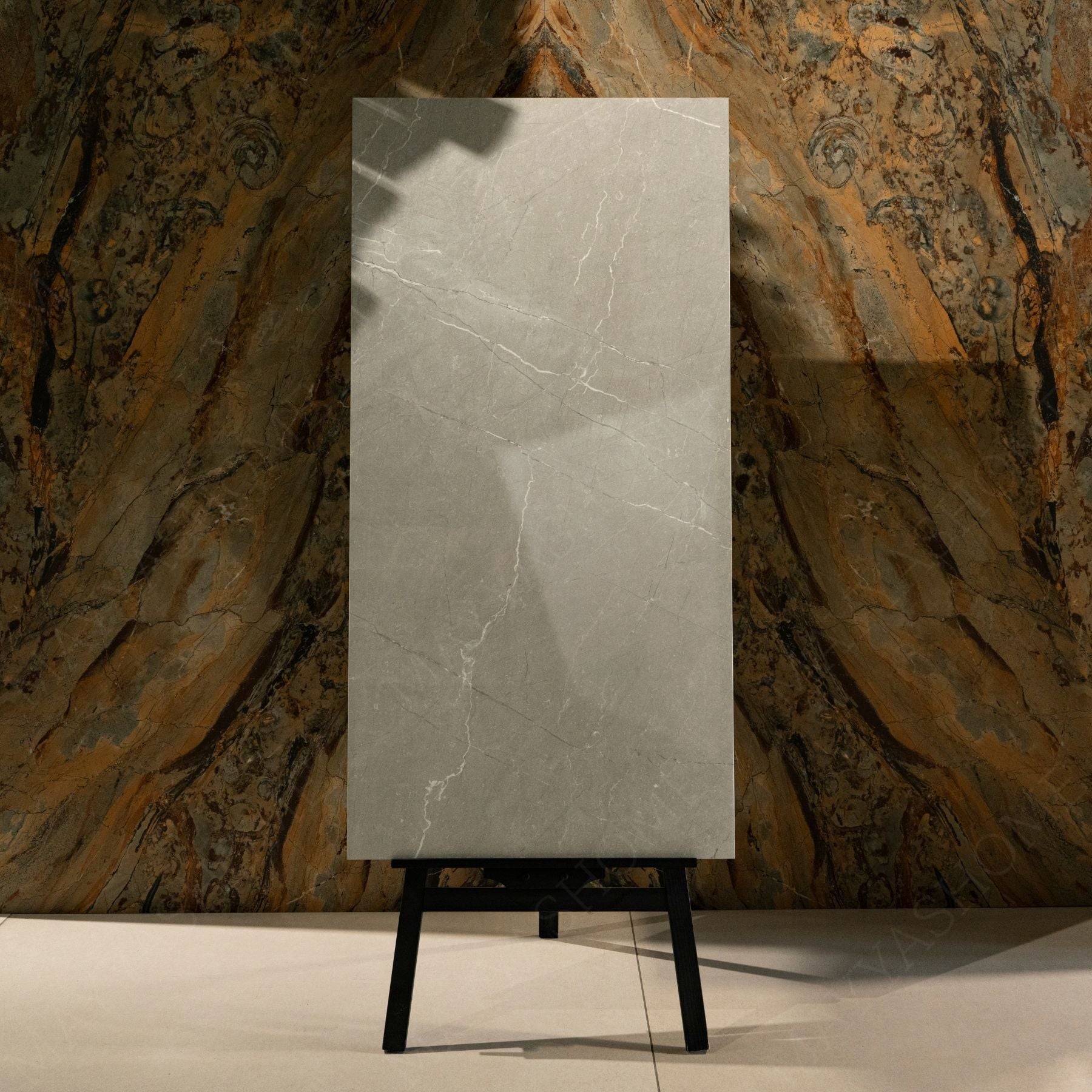 Toscana Grey glossy marble effect porcelain tile 60x120cm with 9mm thickness features soft grey tones, natural veining and polished finish.