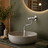 Wall-mounted single-water timed tap with swivel spout, push-button control, adjustable flow and anti-vandal protection for commercial and public washrooms.