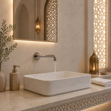 Wall mounted fixed washbasin spout with G1/2 male connection and flow limiter compatibility. Ideal for commercial, hospitality and residential bathrooms in UAE.
