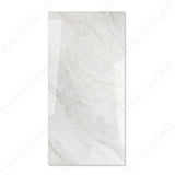 Wazti White glossy marble effect porcelain tile 60x120cm with 9mm thickness features bright white base, subtle veining and polished finish.